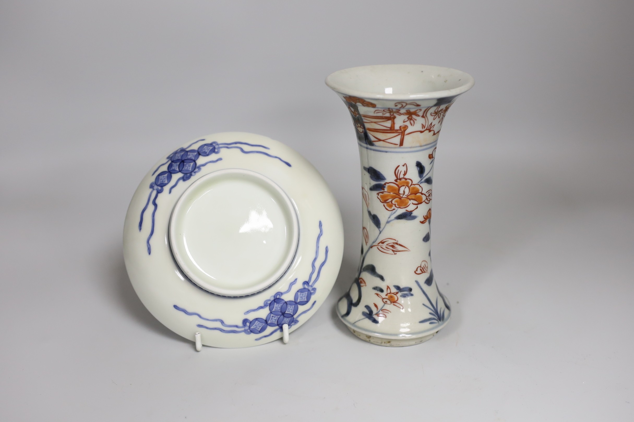 A late 17th century Japanese Imari vase and an Arita dish, vase 18cm